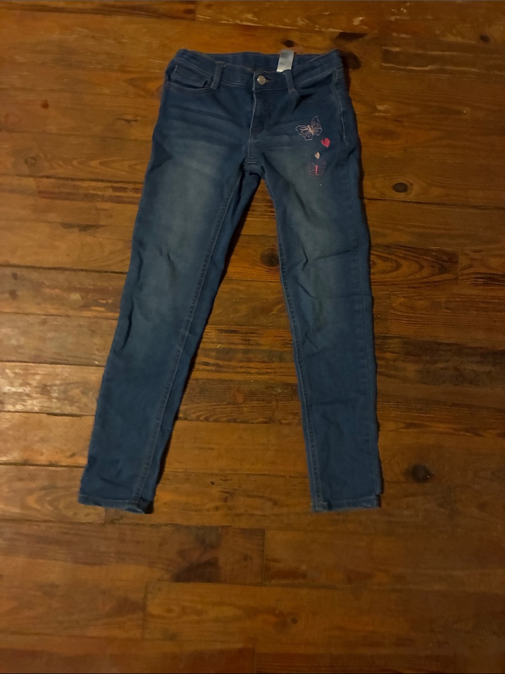 Justice Blue Denim Skinny Jeans with Pink Butterfly Accents